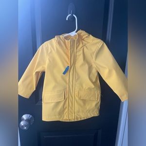 Cat and Jack yellow Raincoat 18m with dinosaur print inside and hood